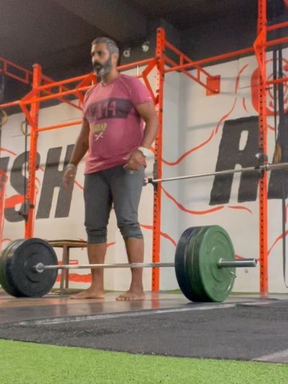 Here I am setting up for a deadlift. Proper technique is everything. It's not just about lifting heavy; it's about doing it right to build muscle, burn fat, and gain strength safely.