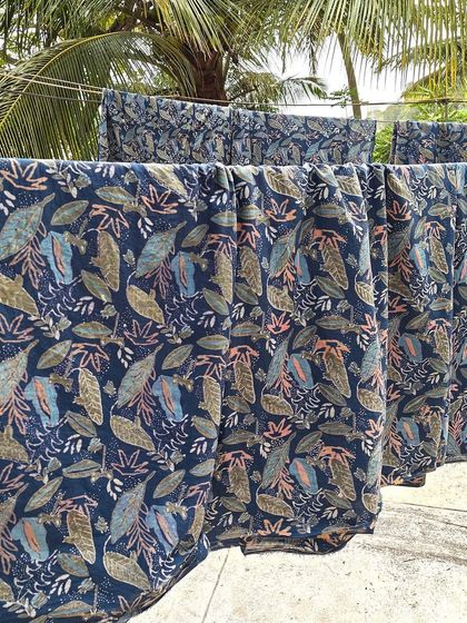 This intricate 7-part block print was created using a discharge printing technique with natural plant resins on organic cotton. The result is a beautiful, magical garden scene with a soft feel and vibrant detail.