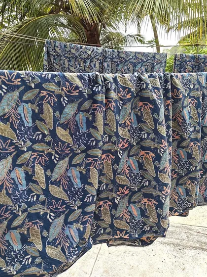 This intricate 7-part block print was created using a discharge printing technique with natural plant resins on organic cotton. The result is a beautiful, magical garden scene with a soft feel and vibrant detail.