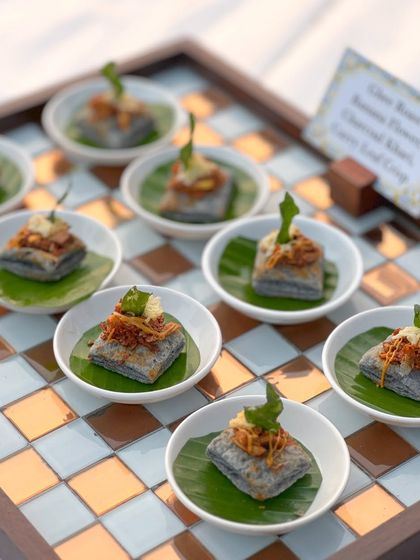 Our Charcoal Khari with Banana Flower is a perfect example of our quest for unique flavour fusions. The savoury, smoky pastry is paired with a delicately prepared banana flower filling.