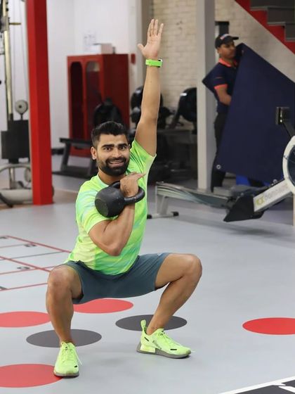 What seems impossible today will one day become your warm-up. This kettlebell squat is a great example of that principle.