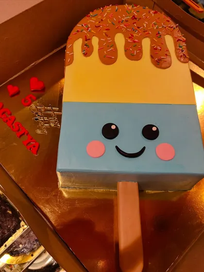 Another view of the adorable and unique ice cream popsicle cake.