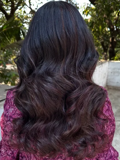 I call this creation 'Brownie + Strawberry Jam'. It's a deep brunette base with swirls of rich red, perfect for someone who wants a hint of color that's both sweet and sophisticated.