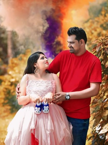 This unique asymmetric gown features layers of peach and red net, creating a beautiful ombre effect. It's a playful and colorful option for an outdoor shoot.