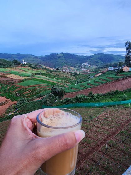 A hot cup of chai with a view of the terraced farms in the Nilgiris. This is the kind of simple pleasure our trips are made of.