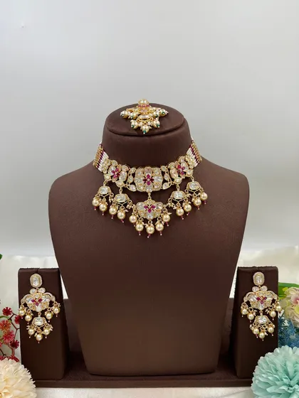 The full 'Noor Nazaakat' set with red accents.
