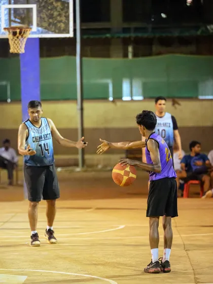 A moment of sportsmanship and strategy as players set up for the next play.