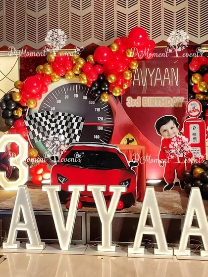 For little ones who love speed, this car-themed birthday stage is a guaranteed winner. Featuring a large sports car prop, a speedometer backdrop, and bold marquee letters, this setup brings high-octane excitement to a 3rd birthday celebration.