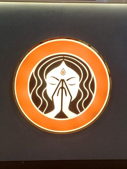 The Grihini Kitchen logo, representing the care and tradition of a homemaker's cooking, which is the heart of my service.