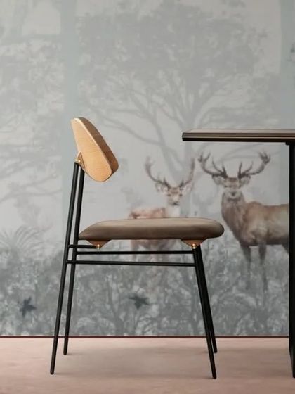 An in-situ view of the deer wallpaper, showing how it can create a calming and nature-inspired backdrop for a dining area.