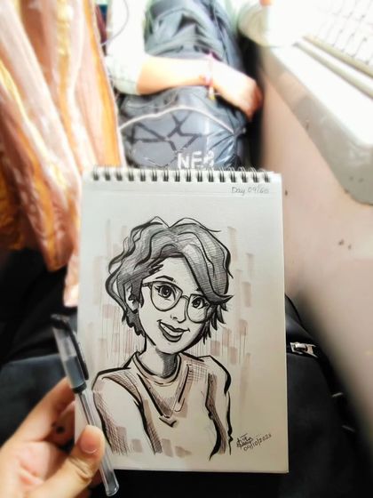 A self-caricature I did of myself. It's fun to turn the pen around and see myself in a new, exaggerated way.