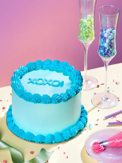 Adding a burst of fun to your celebrations with my pop-colored cakes. This bright blue mini cake is perfect for adding a playful touch to any party.