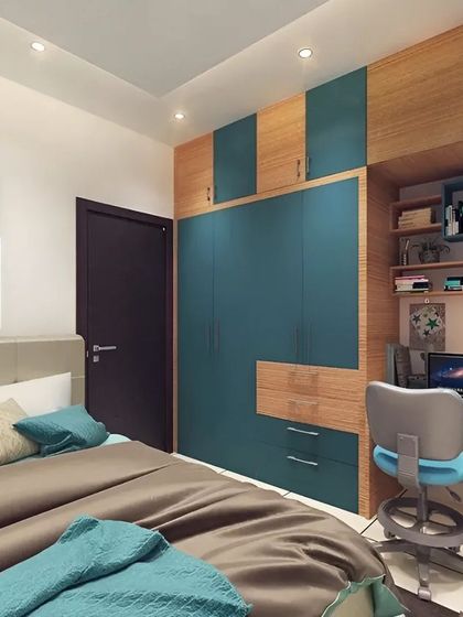A compact bedroom that includes a fully integrated study unit. The desk is built right into the wardrobe, saving space while providing a dedicated area for work or homework.