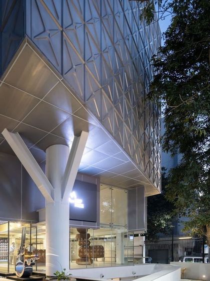 A feature from Archello, showcasing the MAP museum's design and its key features.