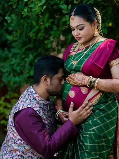 A beautiful portrait of the happy couple. Kruthika's makeup is soft and timeless, perfect for creating lasting memories of her pregnancy journey.