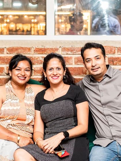 This group of friends is enjoying the cozy seating area.