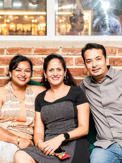 This group of friends is enjoying the cozy seating area.