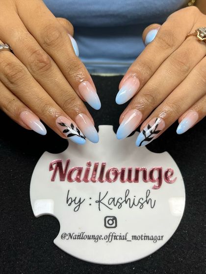 A soft blue ombre set with delicate hand-painted black branches for a serene, nature-inspired look.