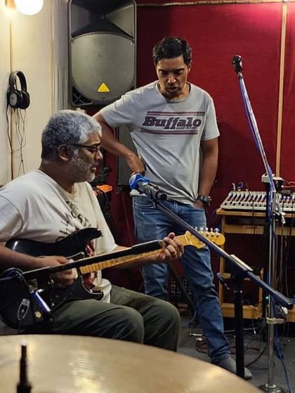 A close-up during the same jam. You can see the concentration as we work through the arrangement.