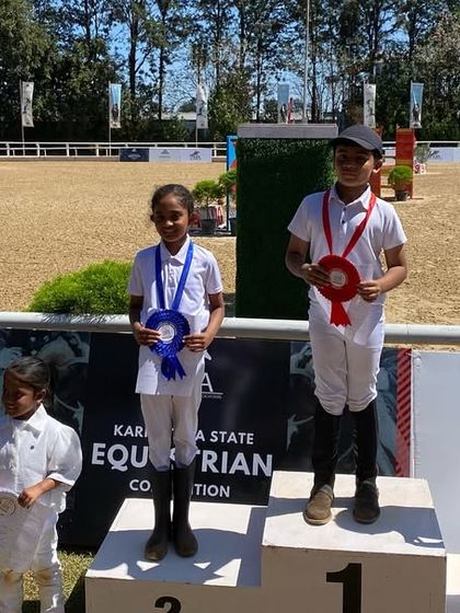 Celebrating our youngest champions in the Lead Rein Dressage category at the state championship. We nurture talent from the very first step.