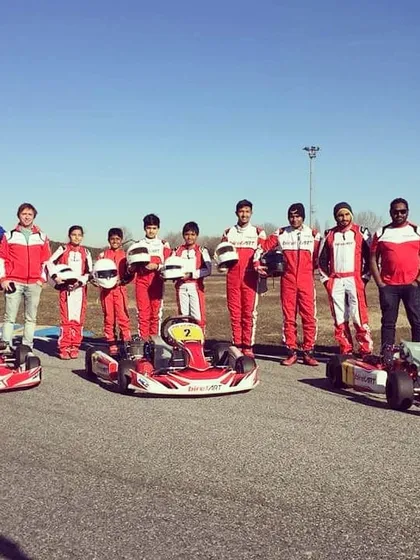 The team lines up on the track in Italy, ready for an intensive winter testing session to prepare for the upcoming season.
