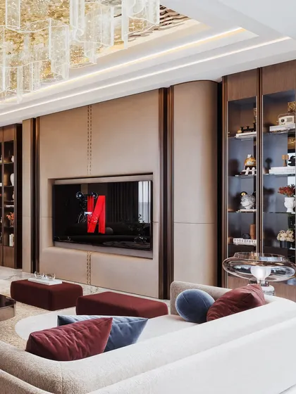 This angle shows the custom TV unit with stitched leather-like paneling and integrated display shelves. The lighting simulation emphasizes the warm, inviting glow within the cabinetry.
