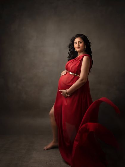 Another beautiful take on the flowing red gown, this time with a softer, more introspective mood.