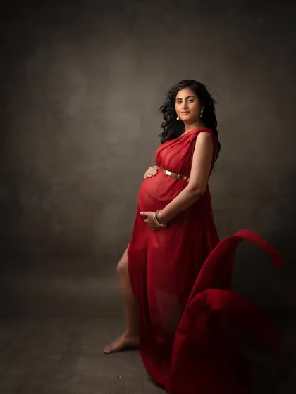 Another beautiful take on the flowing red gown, this time with a softer, more introspective mood.