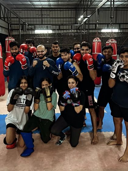 United in strength, fueled by passion. Our MMA tribe stands strong together, embracing every challenge and pushing each other to unleash their potential.