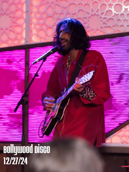 A member of The Kominas on guitar and vocals. Their performance brought a whole new energy to classic Bollywood tracks, which is what my curation is all about.