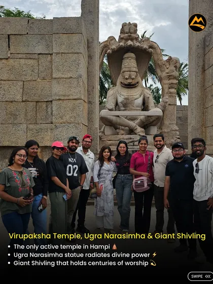 Our group posing in front of the Ugra Narasimha statue at the Virupaksha Temple complex, the only active temple in Hampi.