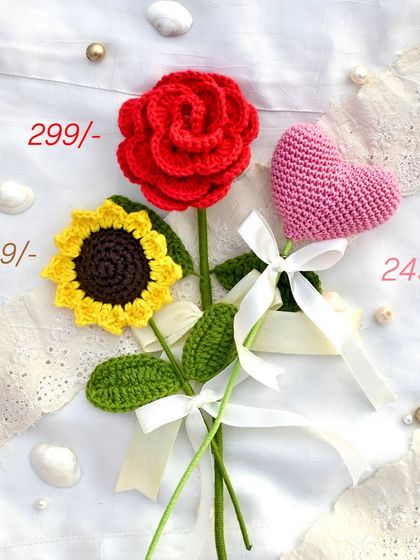 Our hot sellers! This image displays our most popular single stems: a red rose, a sunflower, and a pink heart, with prices listed for each.