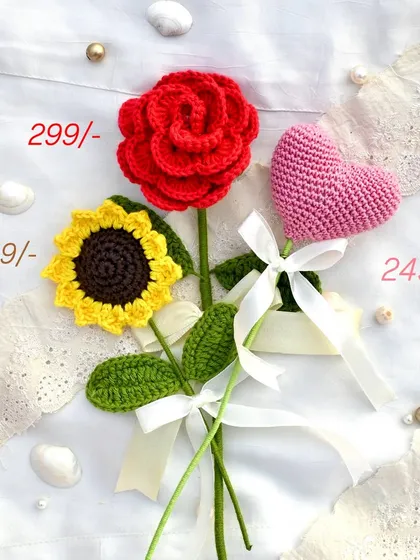 Our hot sellers! This image displays our most popular single stems: a red rose, a sunflower, and a pink heart, with prices listed for each.