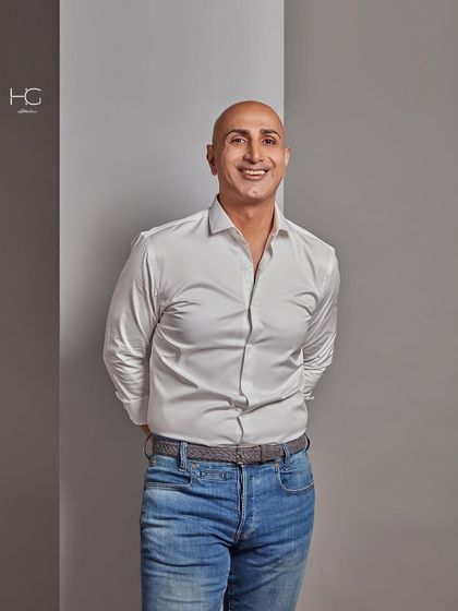 A candid moment of me in the studio. I believe in effortless style, and this look with a classic white shirt and well-fitted jeans is my go-to for a casual day.