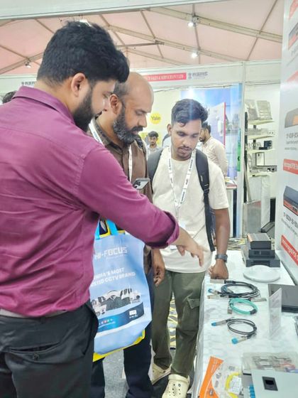 Our expert pointing out the features of our various access control readers and devices to interested visitors at the Autosec Expo.