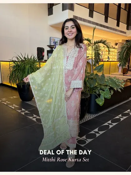The Mitthi Rose Kurta Set combines a lovely rose pink with a contrasting green dupatta. It’s a playful and fresh take on the classic kurta set.