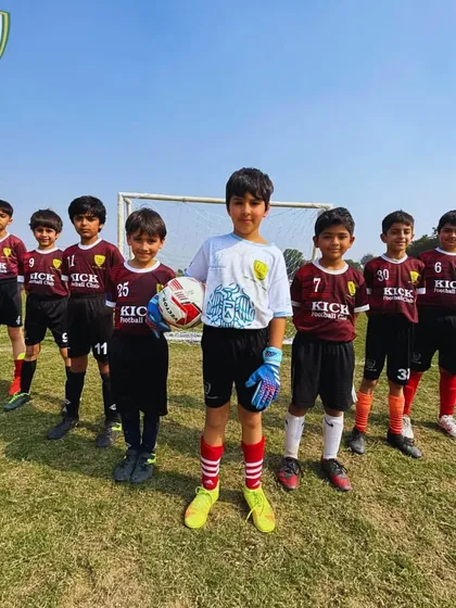 Our U-10 team posing for a photo before a big tournament match, looking confident and ready to play.