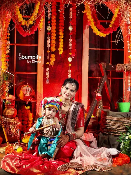 *Maa ki godi mein chhota Gopal.* These Janmashtami photoshoots are so special to me. We create a divine setting in the studio to capture your little one as Krishna, creating a memory that feels both grand and deeply personal.