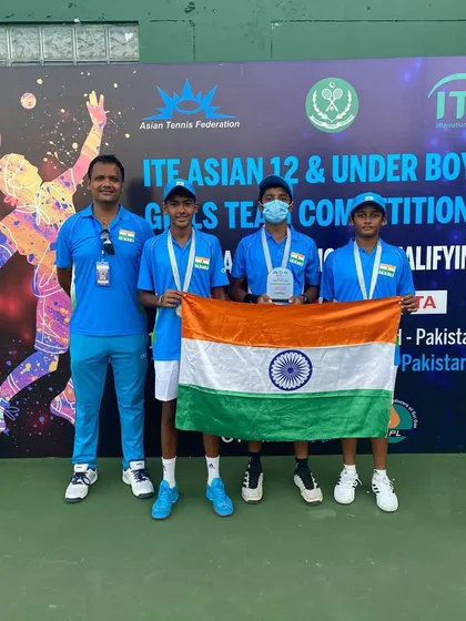 My role extends to shaping tennis at a national level. Here I am as the captain of the Indian U-12 boys' team, alongside the girls' team, as we prepared to compete in the ITF Asian Qualifying event in Pakistan. We guide players to represent their country.