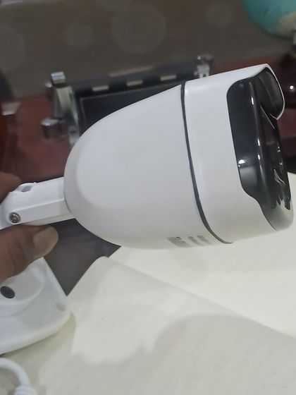 A side profile of a modern bullet camera, showing its sleek and durable housing designed for outdoor use.