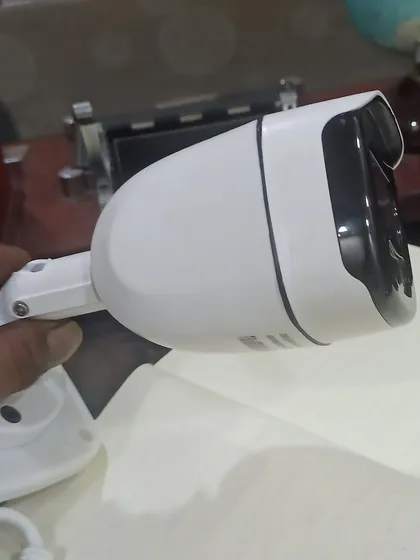 A side profile of a modern bullet camera, showing its sleek and durable housing designed for outdoor use.