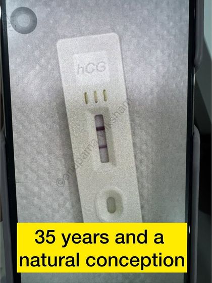 A close-up of the positive pregnancy test from a 35-year-old who conceived naturally. A picture of pure hope.