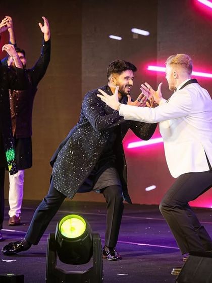 A hilarious and interactive moment from the groomsmen's performance, full of fun and bromance.