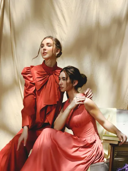 Two models, one cohesive vision. I created complementary soft glam looks for this shot, using warm, rosy tones to tie their makeup together and create a harmonious, dreamy image.