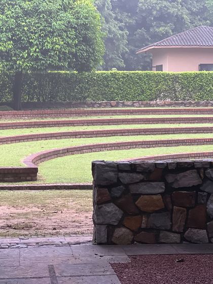 The tranquil, stepped amphitheater at our weekend retreat venue. This peaceful setting provides a perfect backdrop for outdoor talks and quiet contemplation.