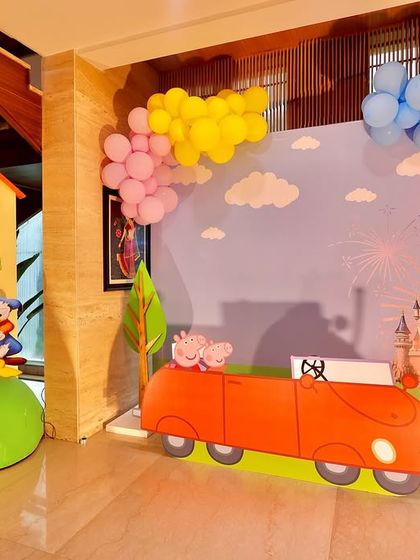 Another perspective of the indoor Peppaland setup, showcasing the thoughtful placement of props and backdrops to create an immersive and imaginative play space.