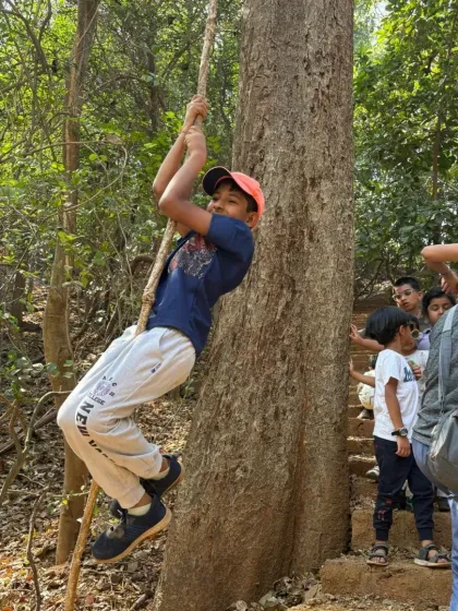 Pure joy and a sense of accomplishment as this young trekker uses the rope to climb. It's all about building confidence and having fun.