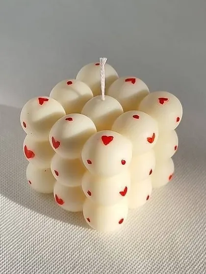 A special order for Galentine's Day. Our classic bubble candle gets a lovely update with tiny hand-painted red hearts.