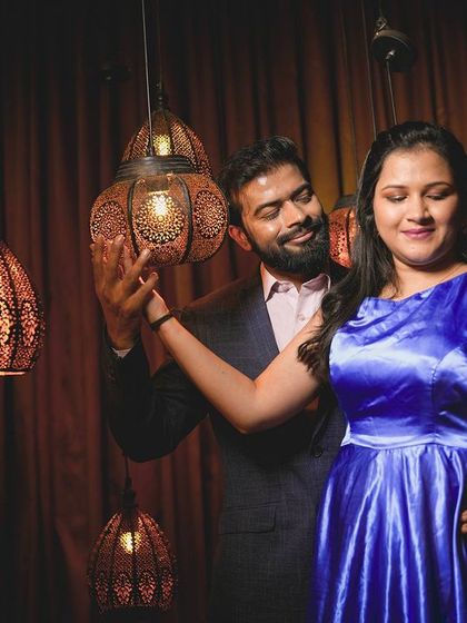 A romantic dance in our royal room, with the hanging lamps creating a warm and intimate atmosphere.