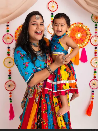 Twirling into the Navratri festival with matching outfits and the biggest smiles. I adore capturing these vibrant mother-daughter moments, full of cultural joy and connection.